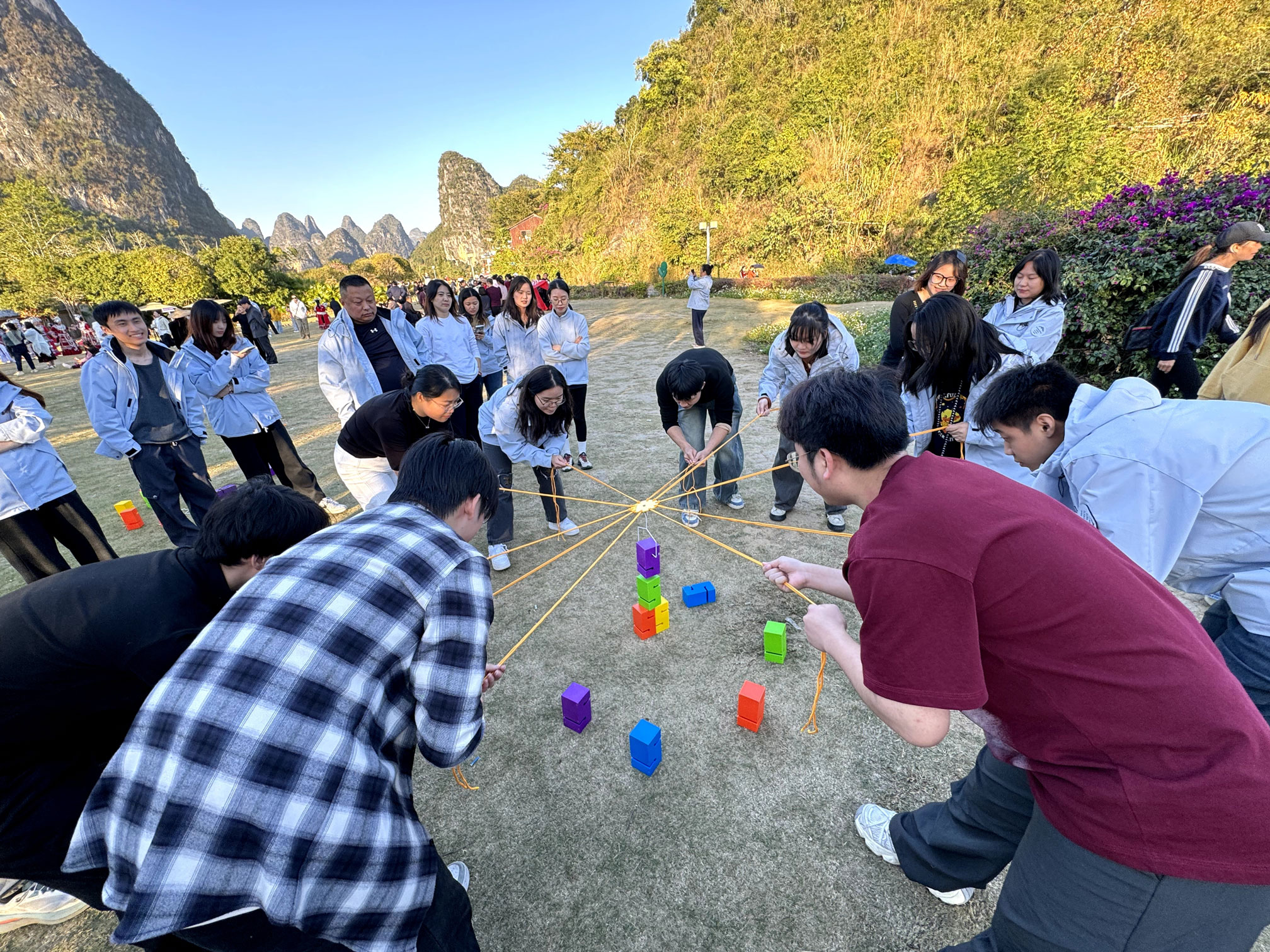 Beneox colleagues working together during a team game